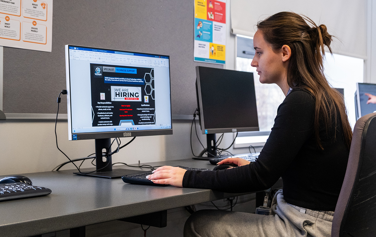Adult learner at a computer