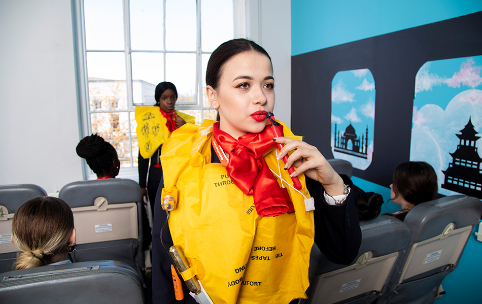 Travel and tourism student giving an instructional demo