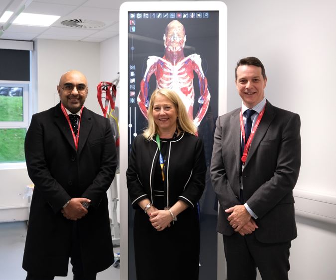 Janet Gardner stands with Barts Health leadership in health suite